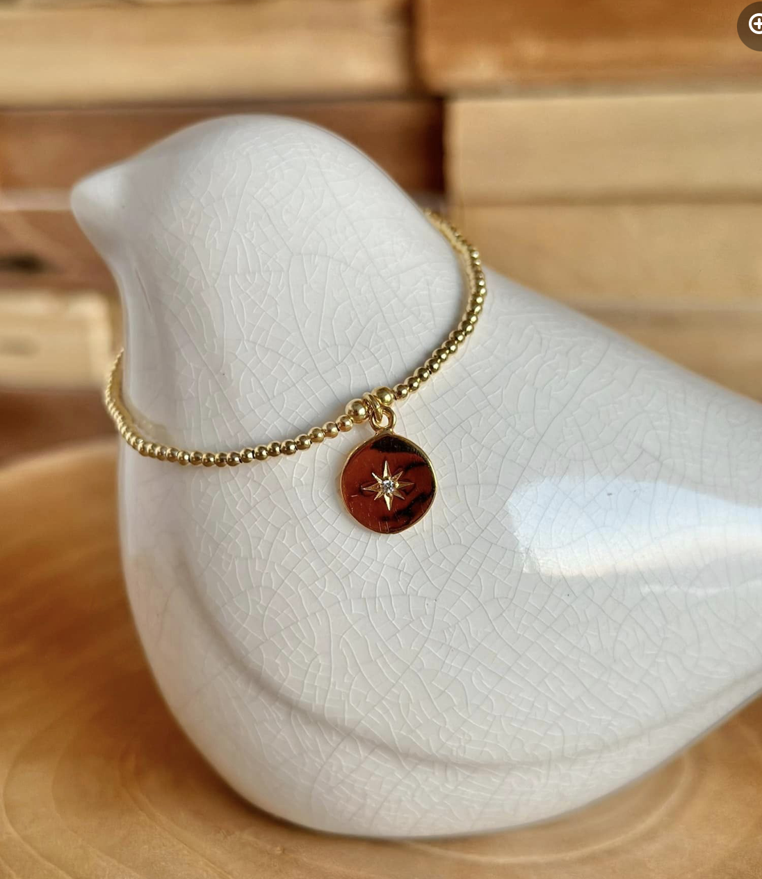 Bracelet or, pendentif rose des vents