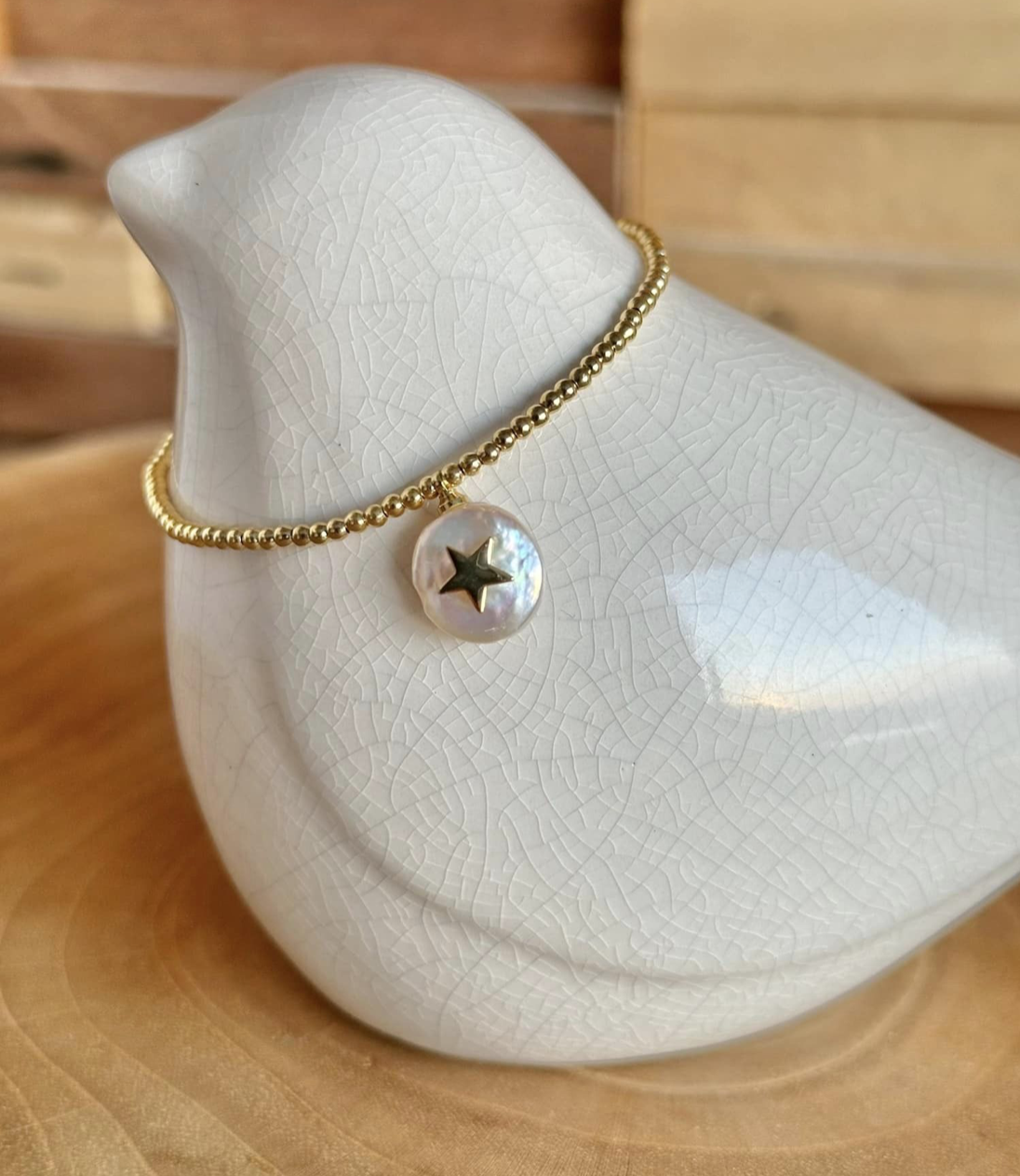 Bracelet or, pendentif goutte en perle et etoile