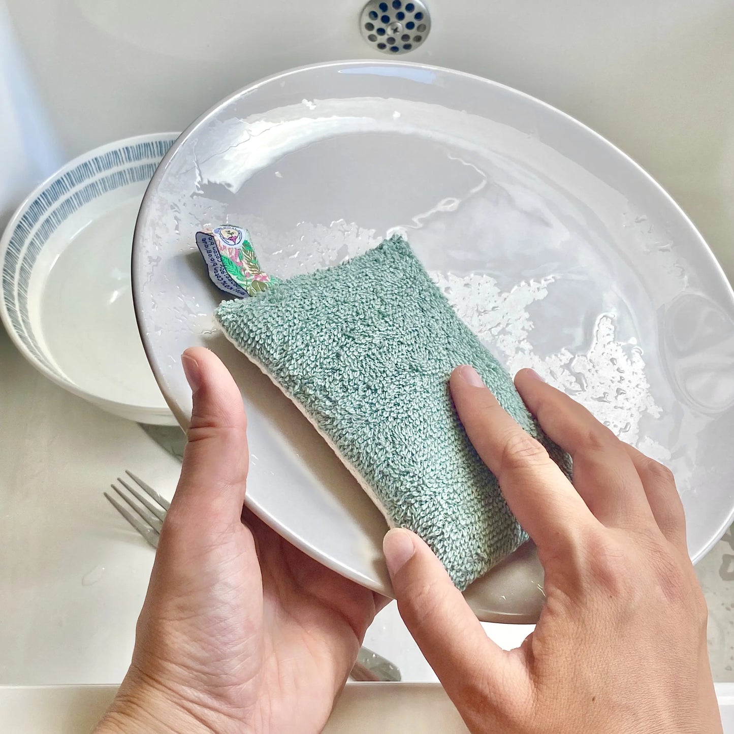 éponge lavable réutilisable verte vaisselle évier assiette zéro déchet