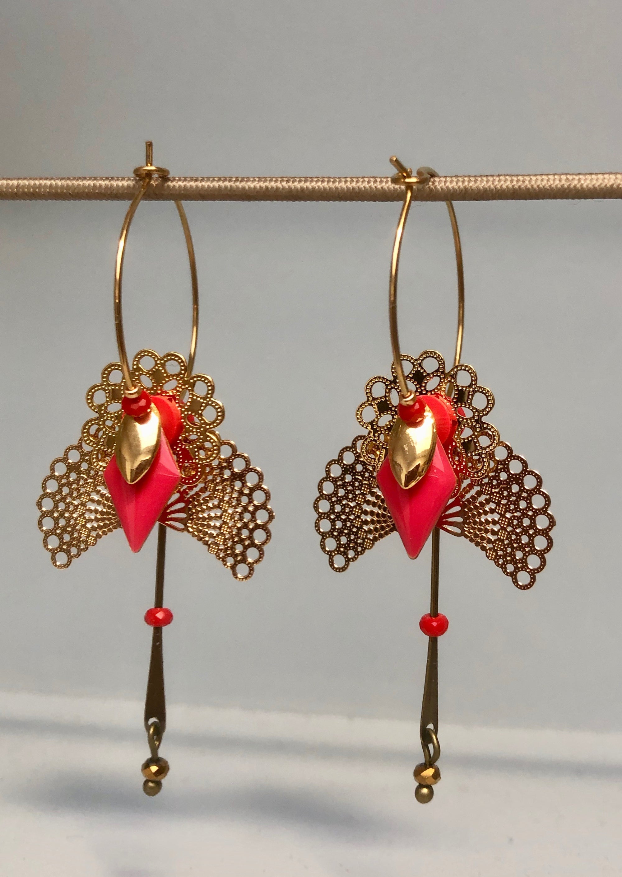 Créoles oiseaux rouge