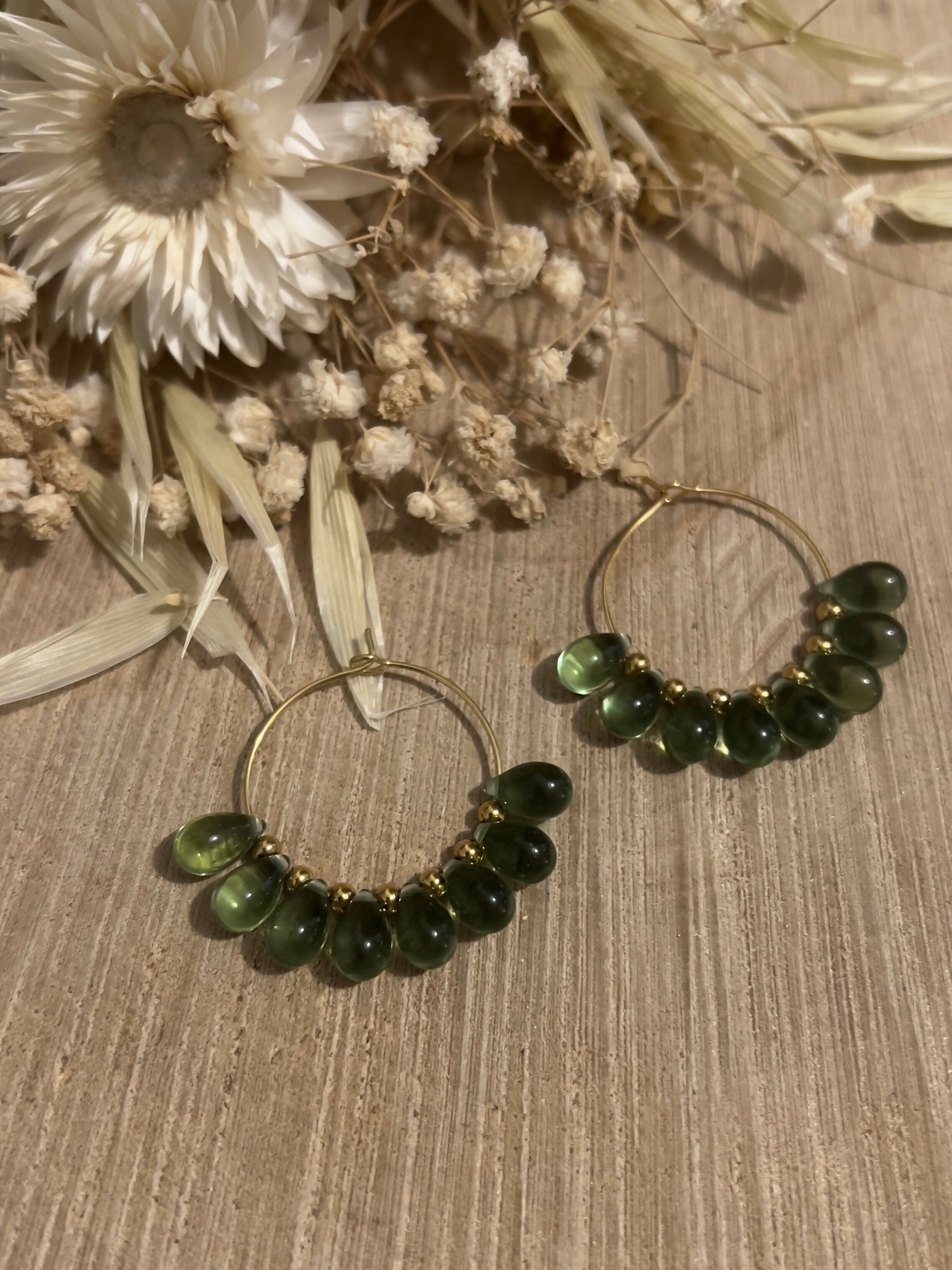 Green droplet hoop earrings