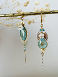 Blue asymmetrical floral earrings