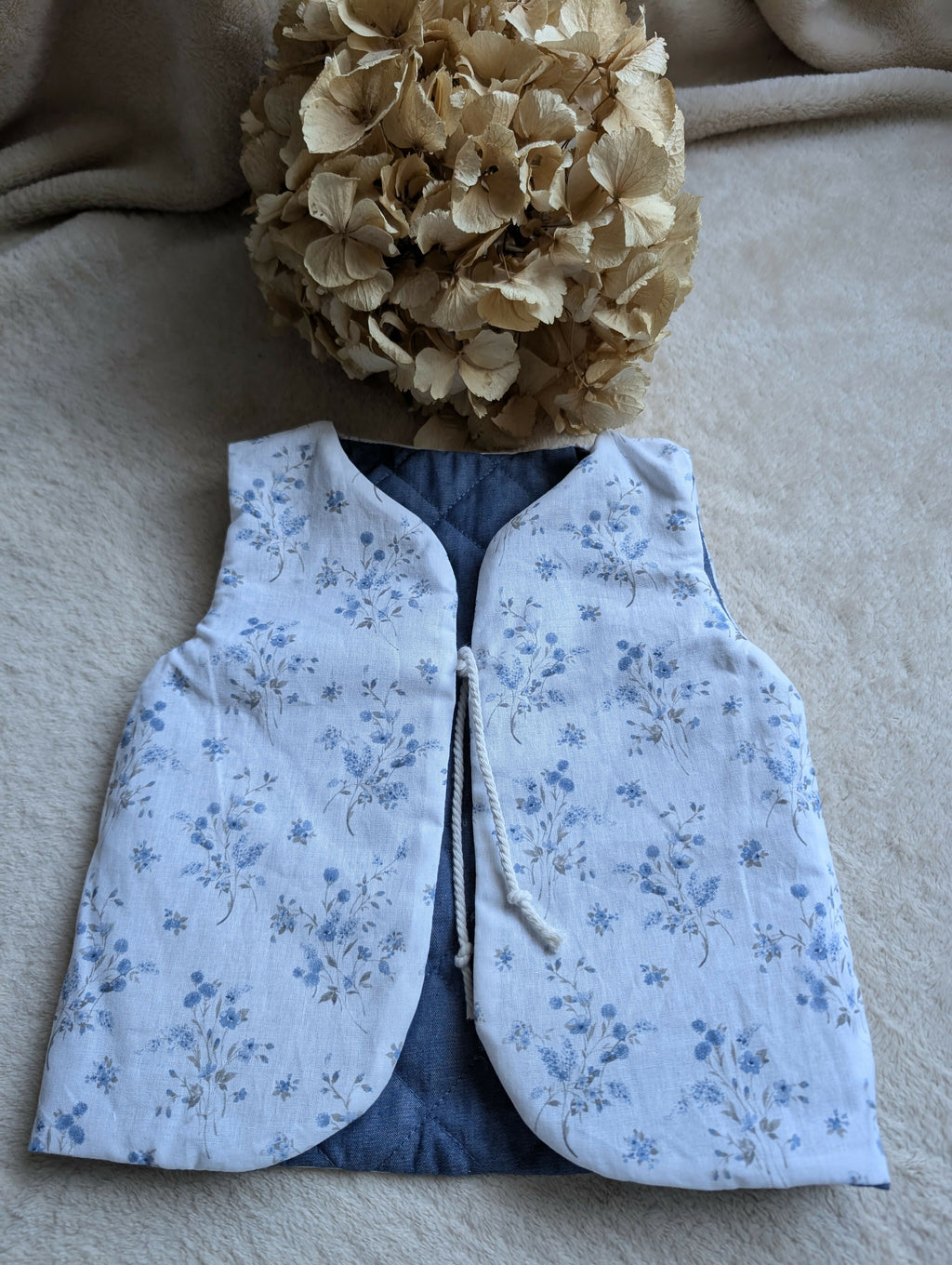 QUILTED SHEPHERD VEST BLUE DENIM WITH BLUE FLOWERS 18 MONTHS-3 YEARS
