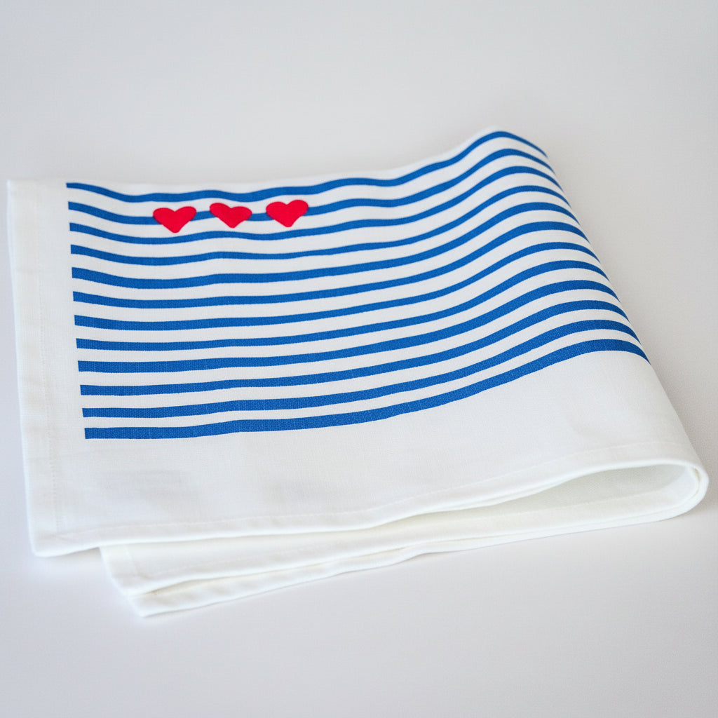 La serviette de table à l'unité "Amour en mer"