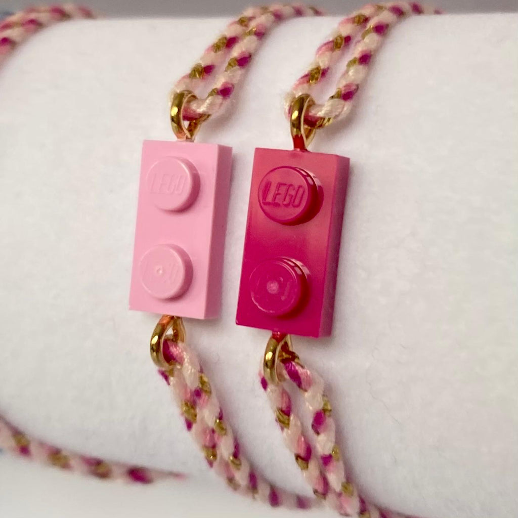 Adjustable braided pink gradient cord bracelet