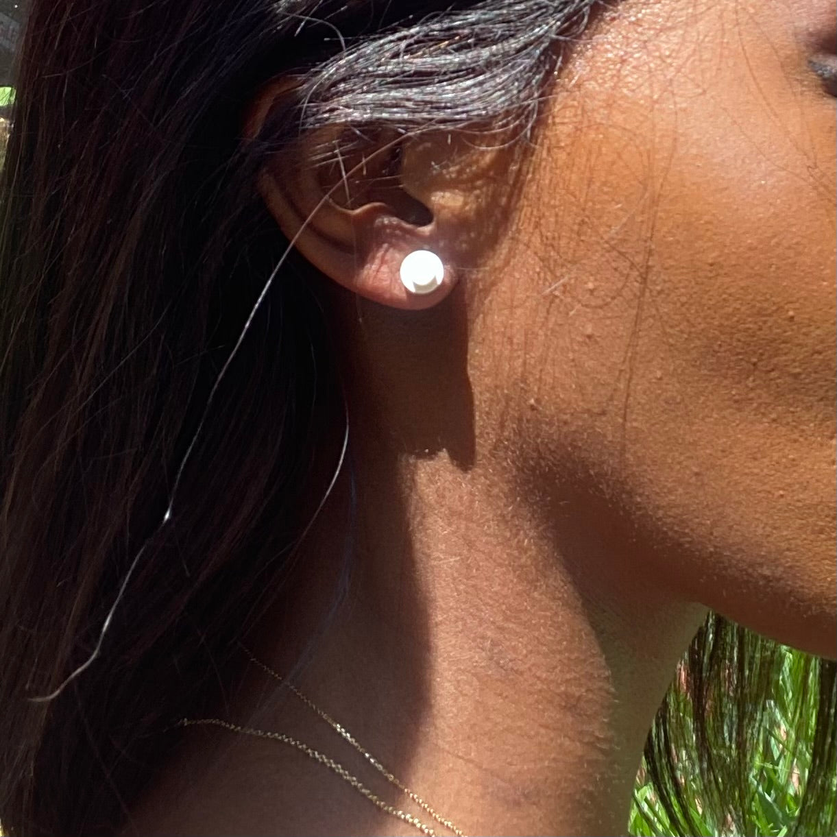 Earrings with a round Lego brick