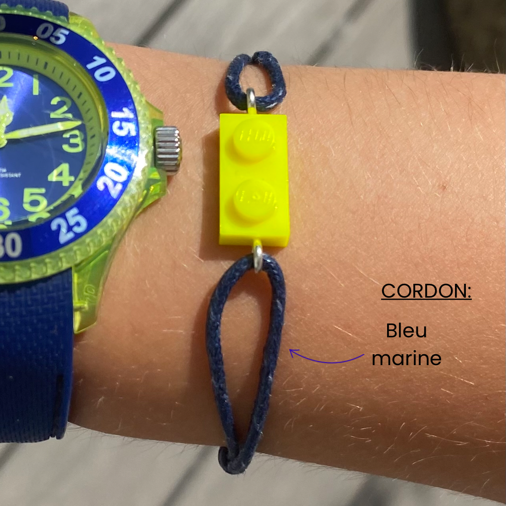 Fluorescent bracelet with a Lego® and an adjustable cord