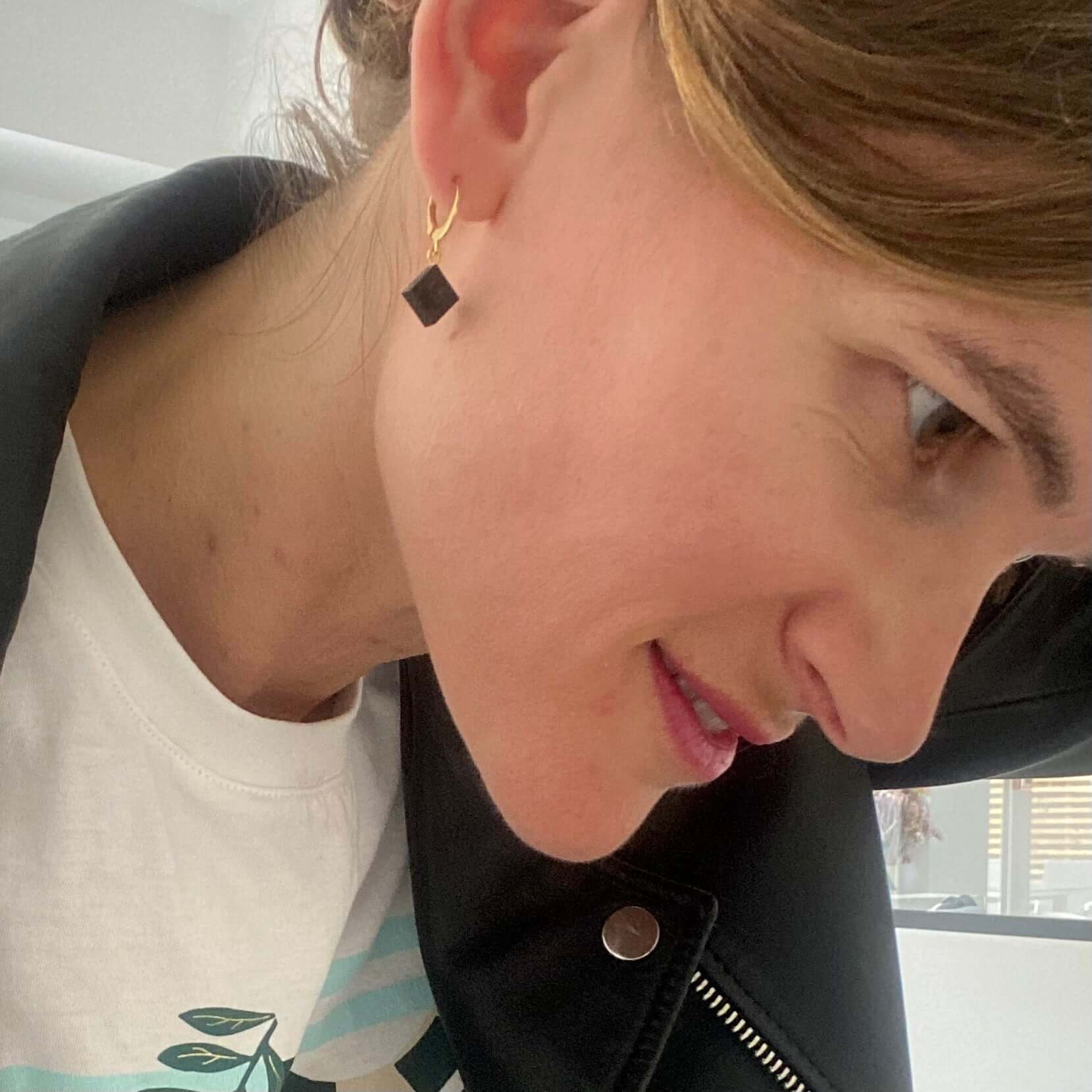Mini stainless steel sleeper earrings with a Lego® brick