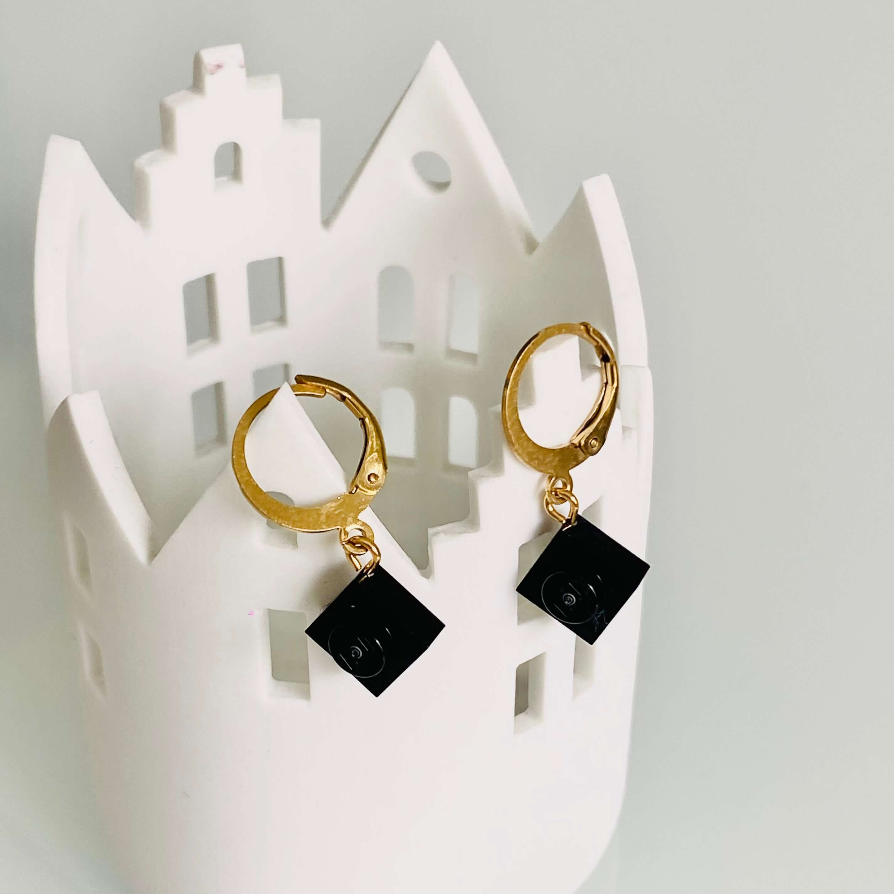 Mini stainless steel sleeper earrings with a Lego® brick