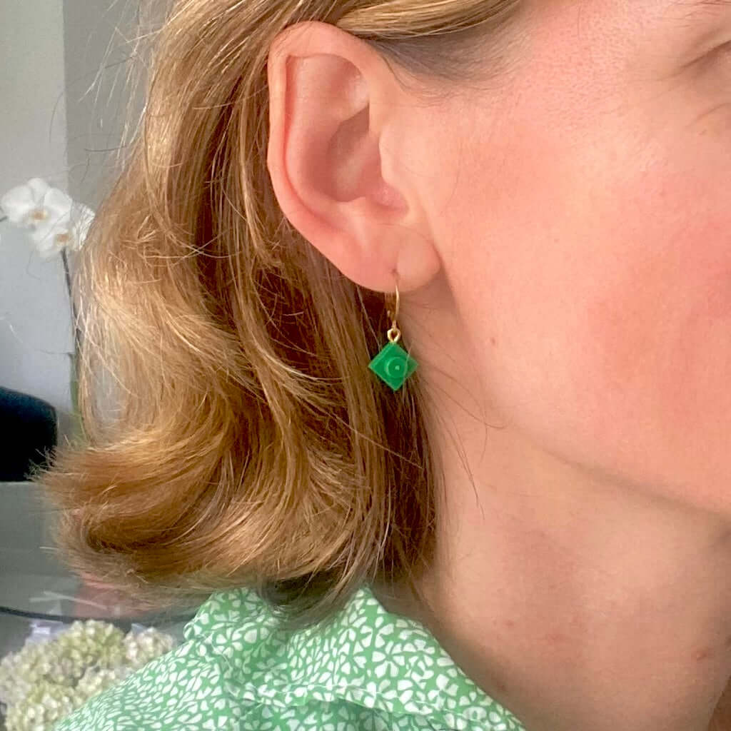 Mini stainless steel sleeper earrings with a Lego® brick