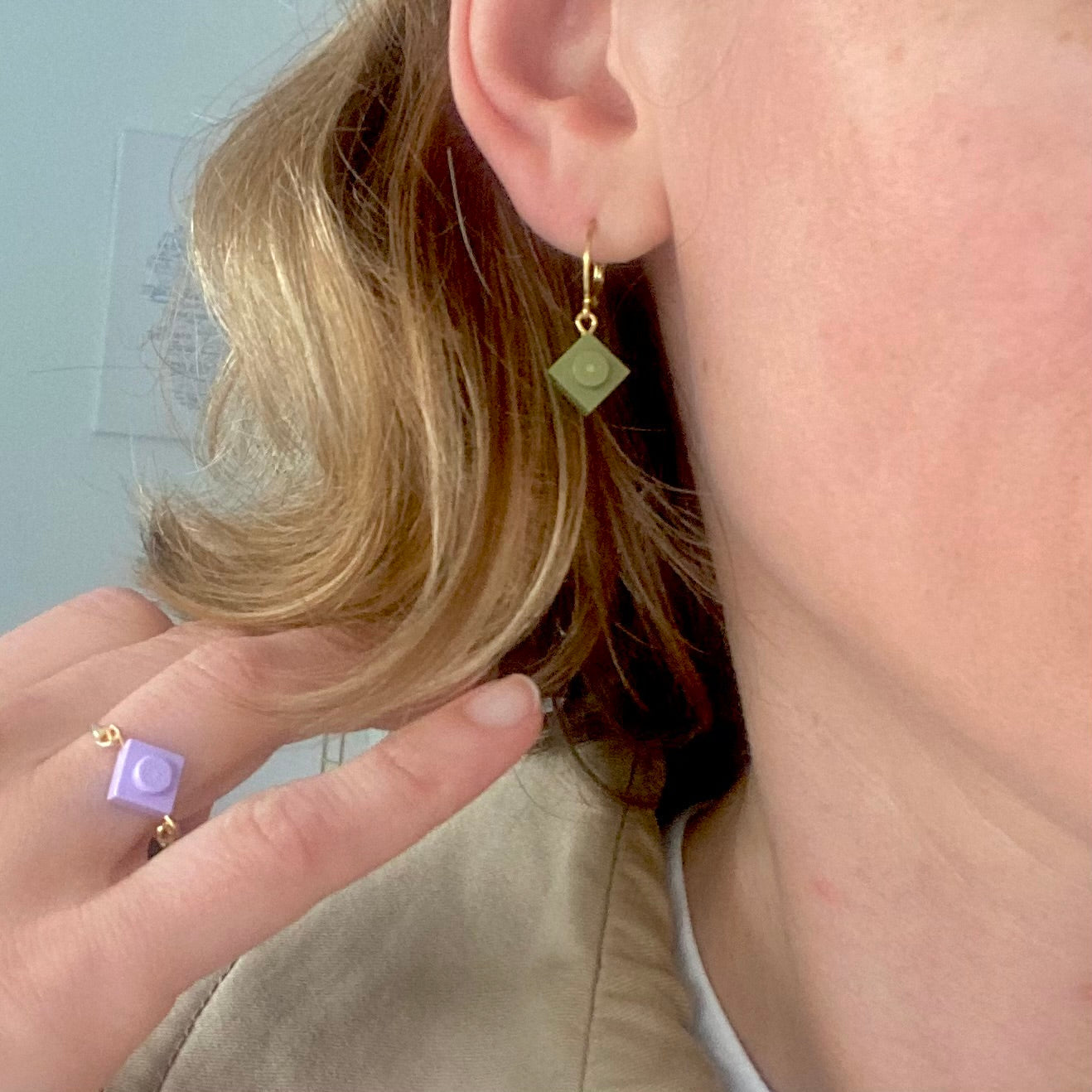 Mini stainless steel sleeper earrings with a Lego® brick