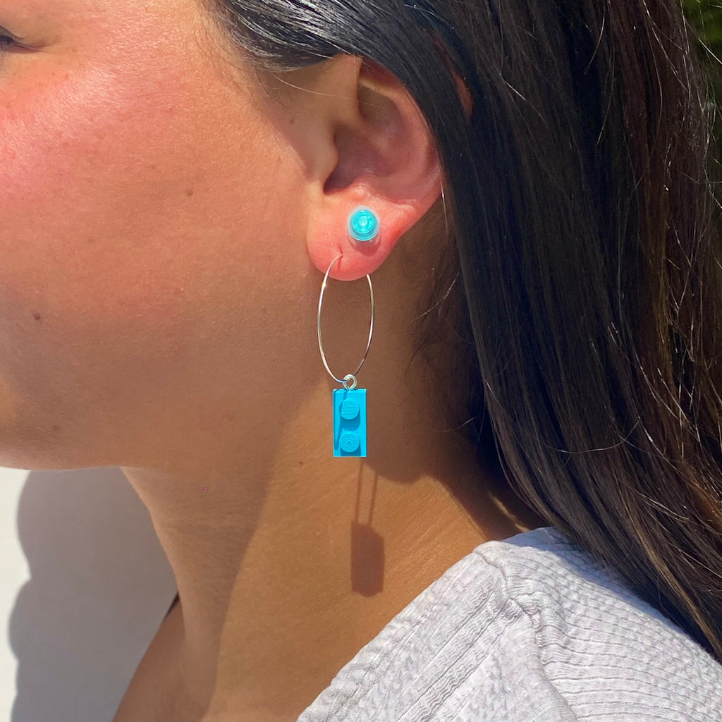 Earrings with a round Lego brick