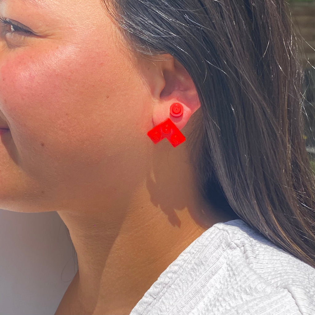 Earrings with a round Lego brick