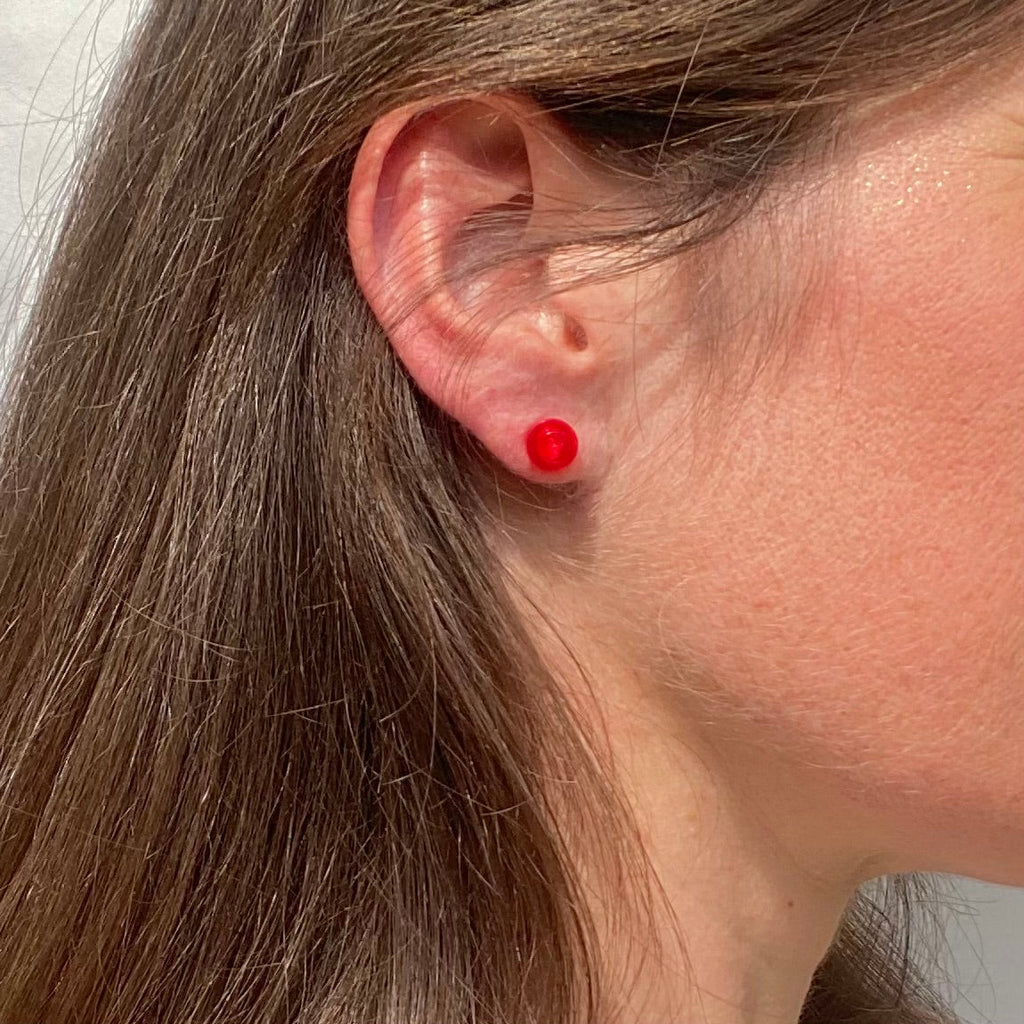 Earrings with a round Lego brick