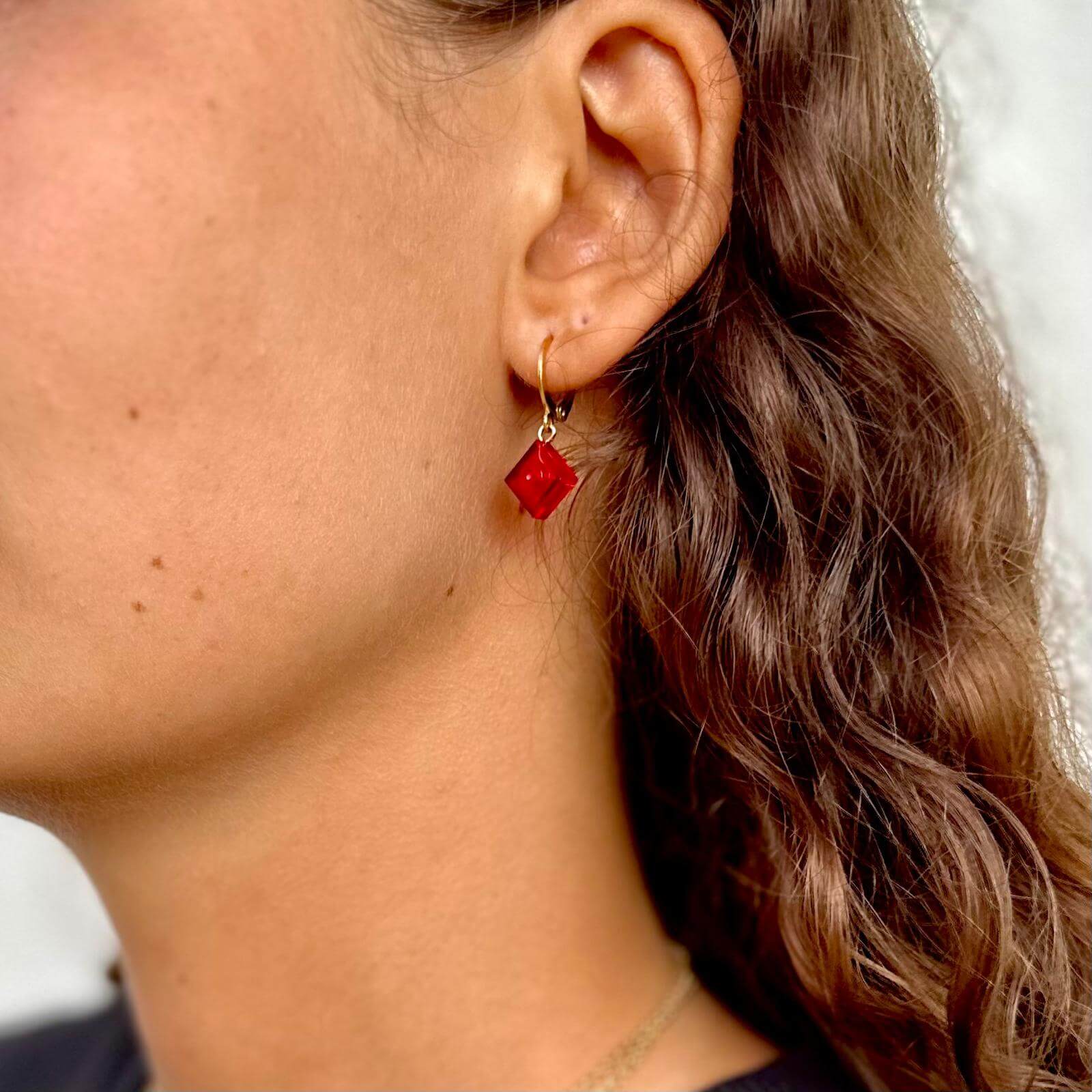 Mini stainless steel sleeper earrings with a Lego® brick