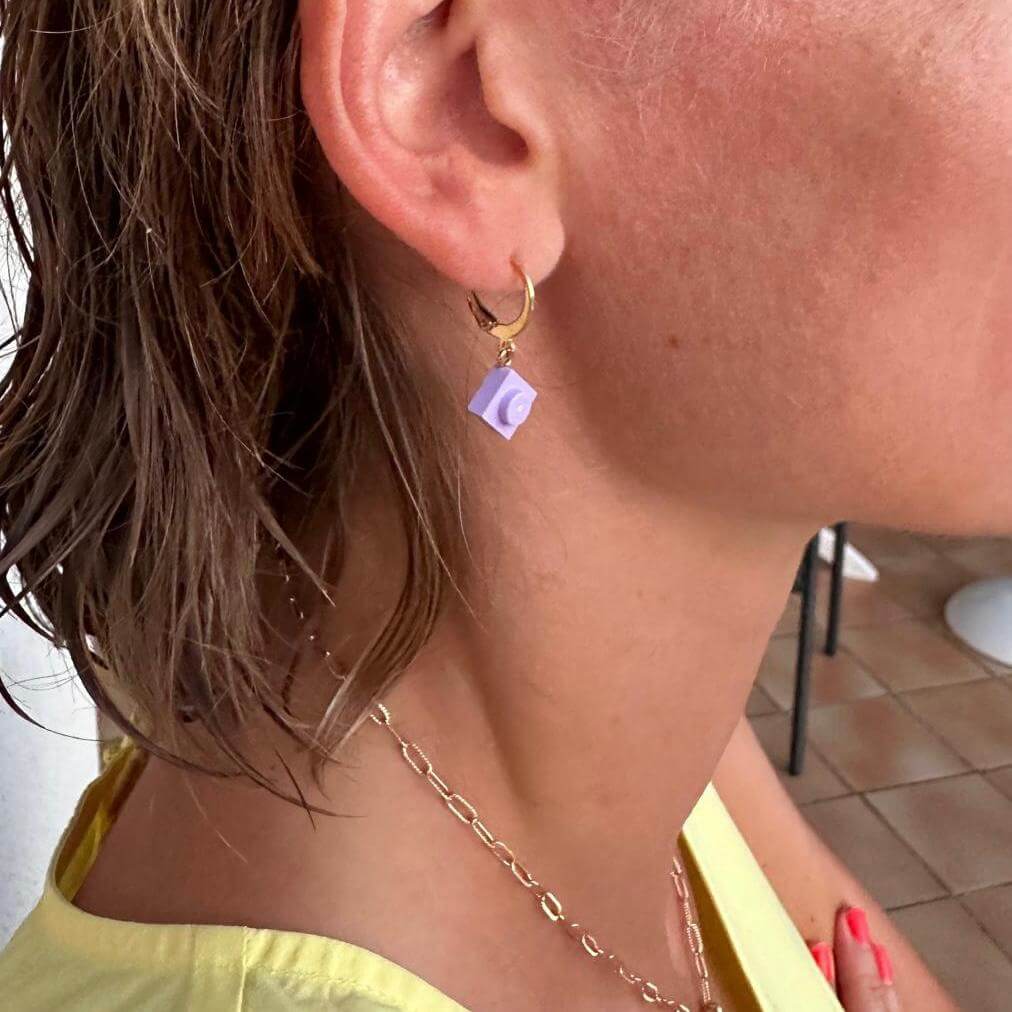 Mini stainless steel sleeper earrings with a Lego® brick