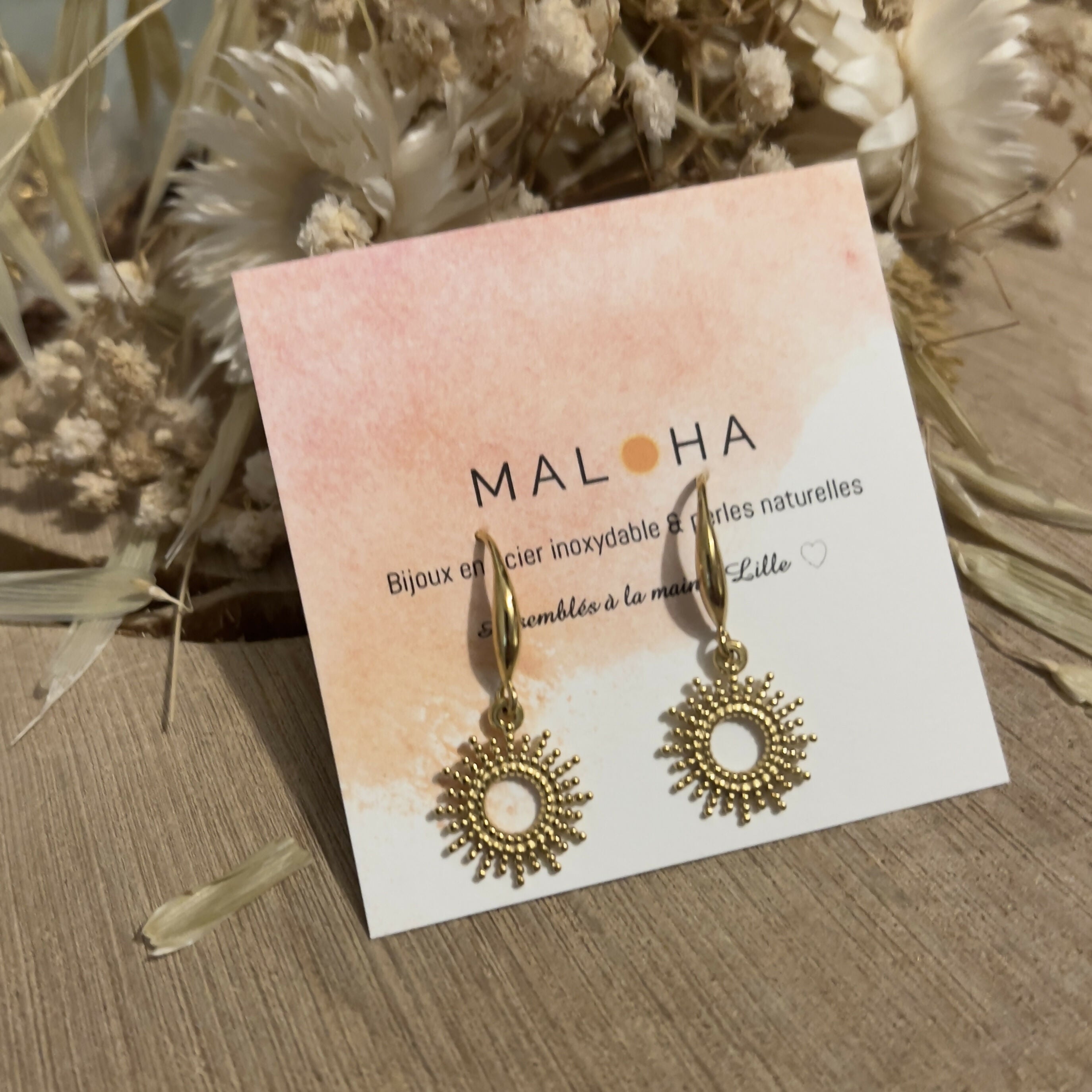Small golden sun-dangle earrings