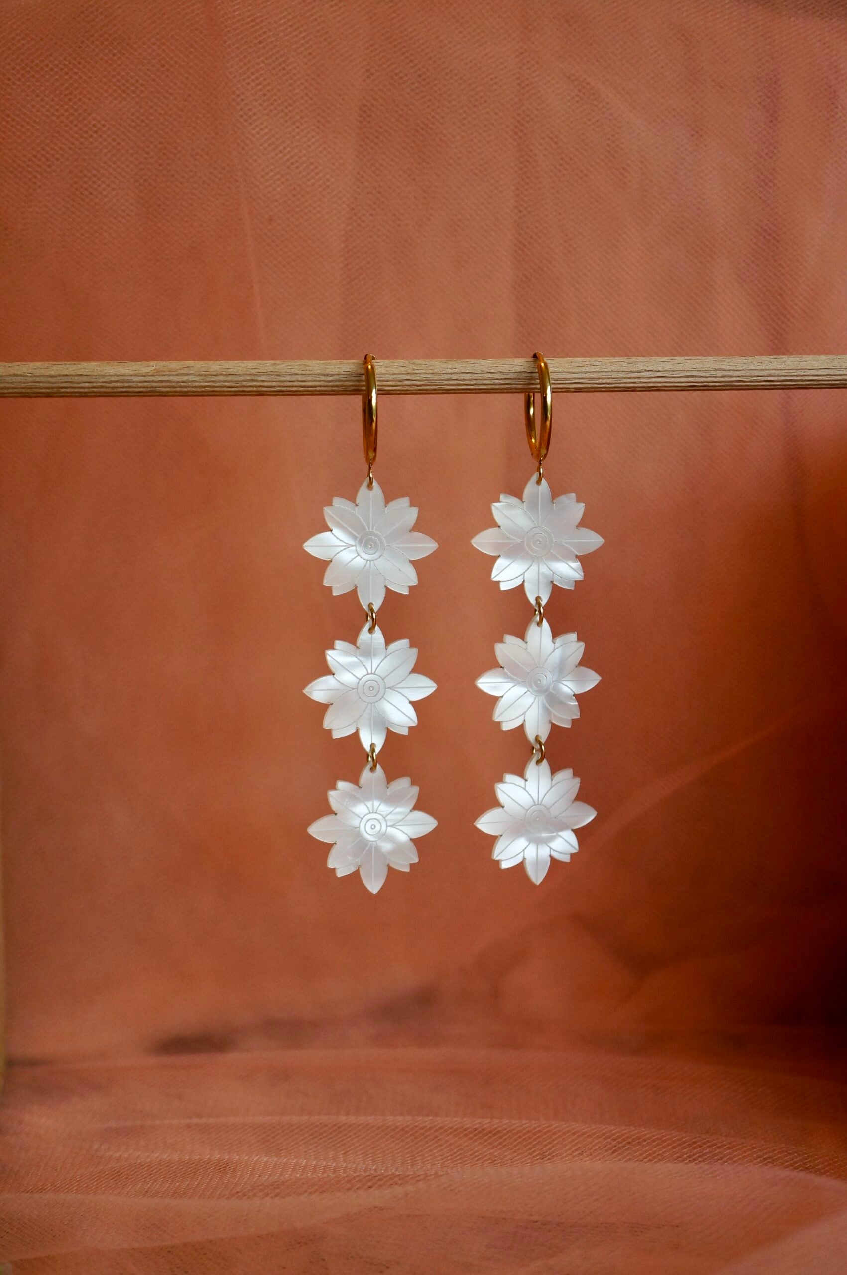 Maxi Jill earrings: iridescent plexiglass trio of hanging flowers