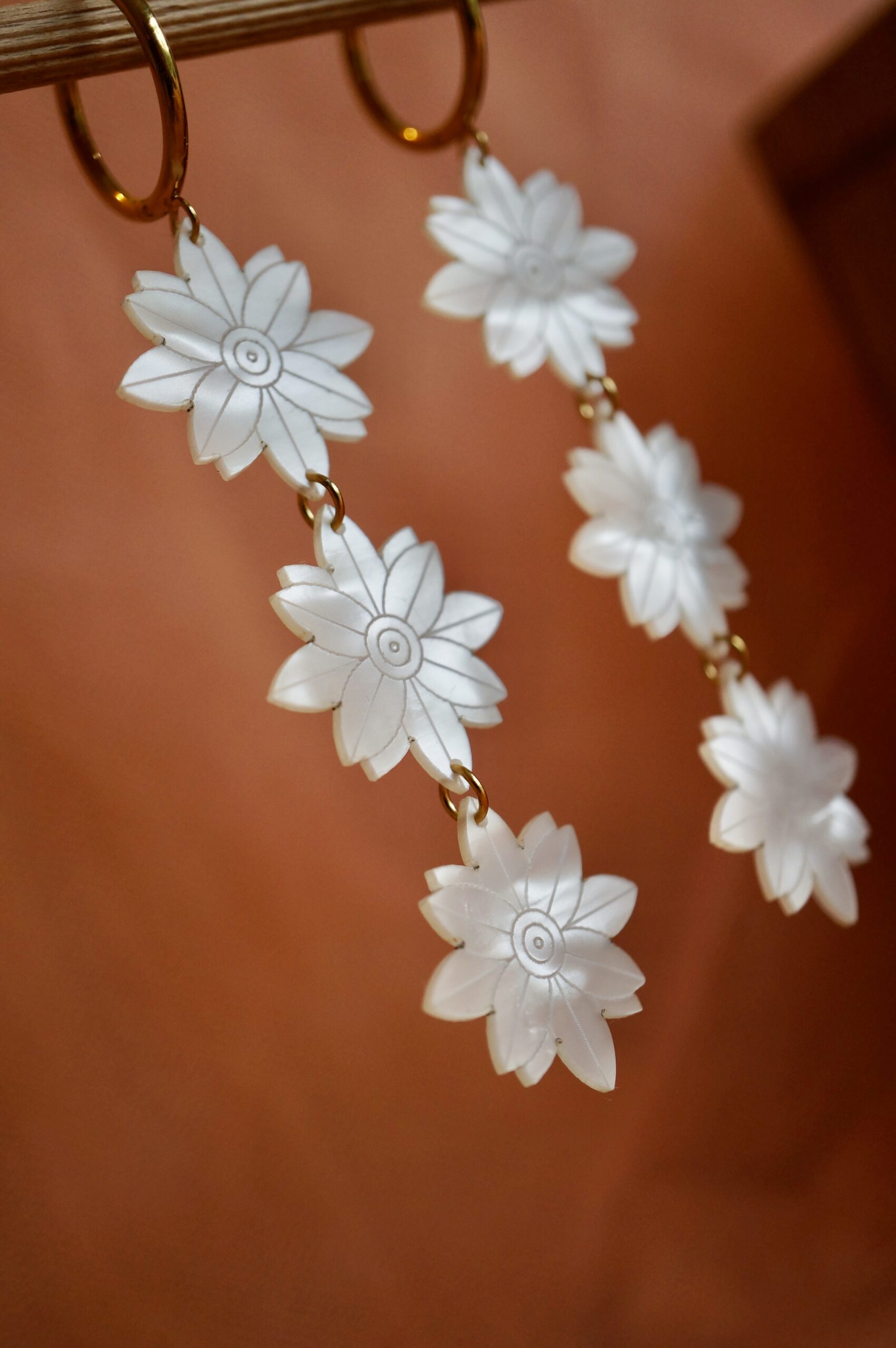 Maxi Jill earrings: iridescent plexiglass trio of hanging flowers