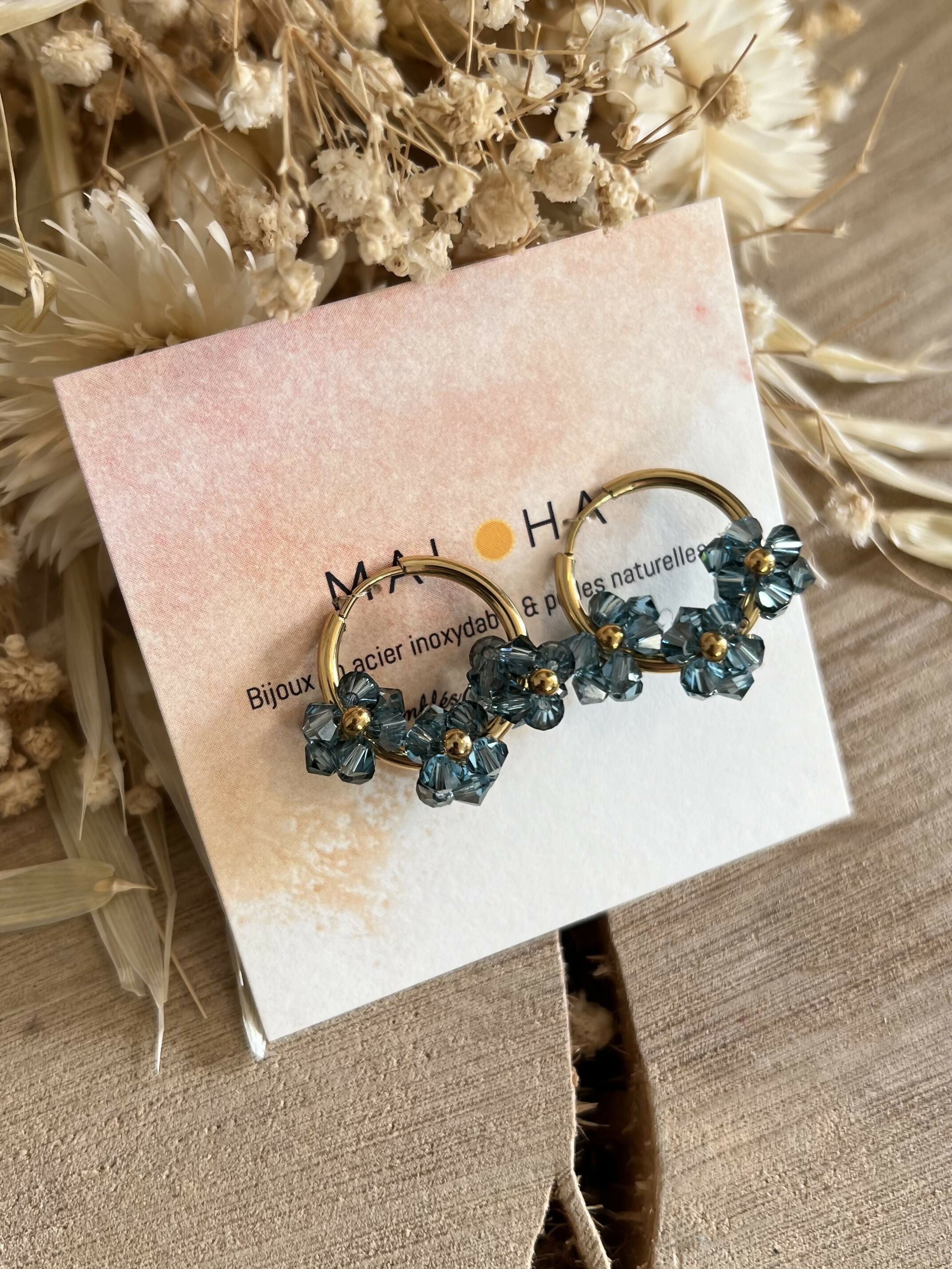 Large blue glass flower hoop earrings
