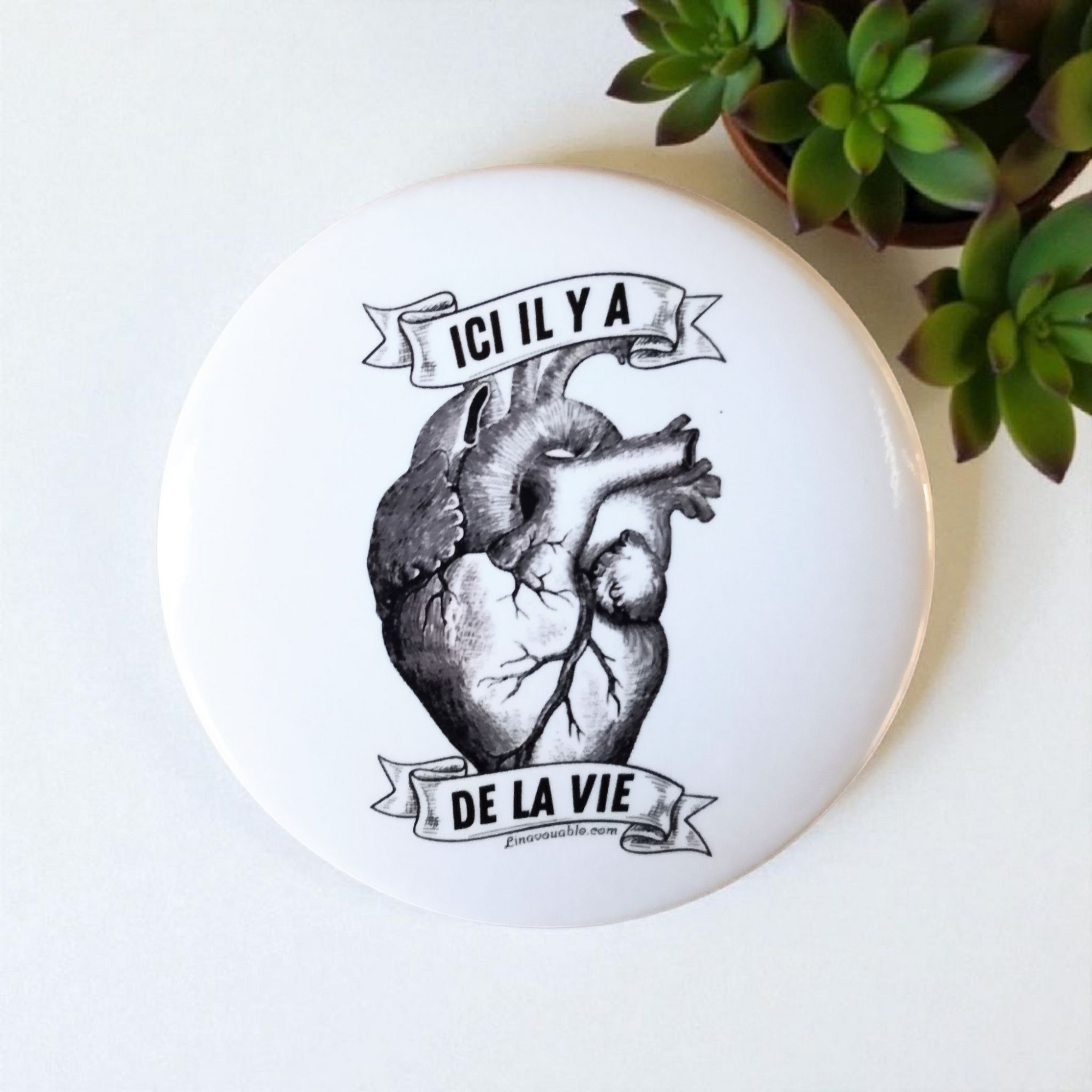 BADGE "ICI, IL Y A DE LA VIE"