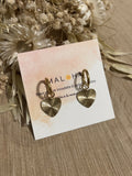 Hoop earrings & their striped golden hearts