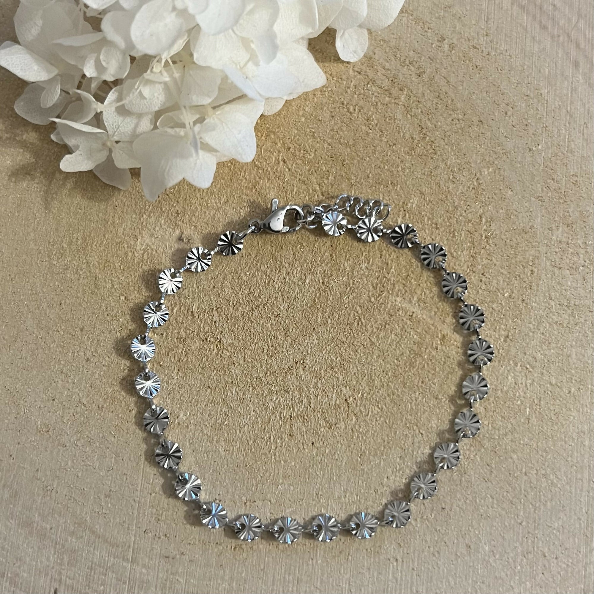 Bracelet petits soleils argentés