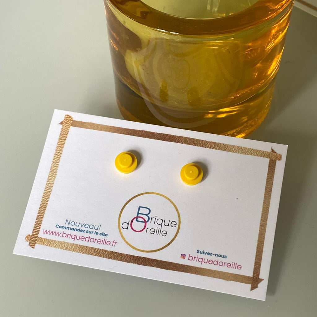 Earrings with a round Lego brick