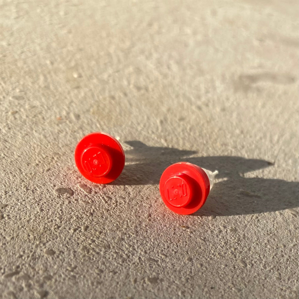 Earrings with a round Lego brick