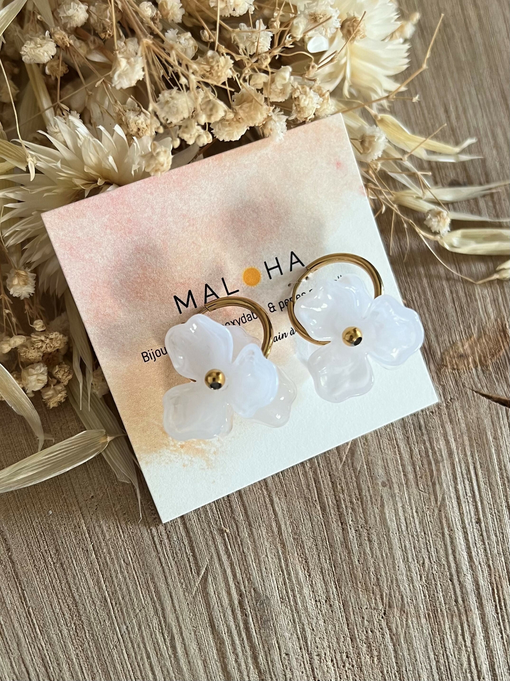 Large white floral hoop earrings