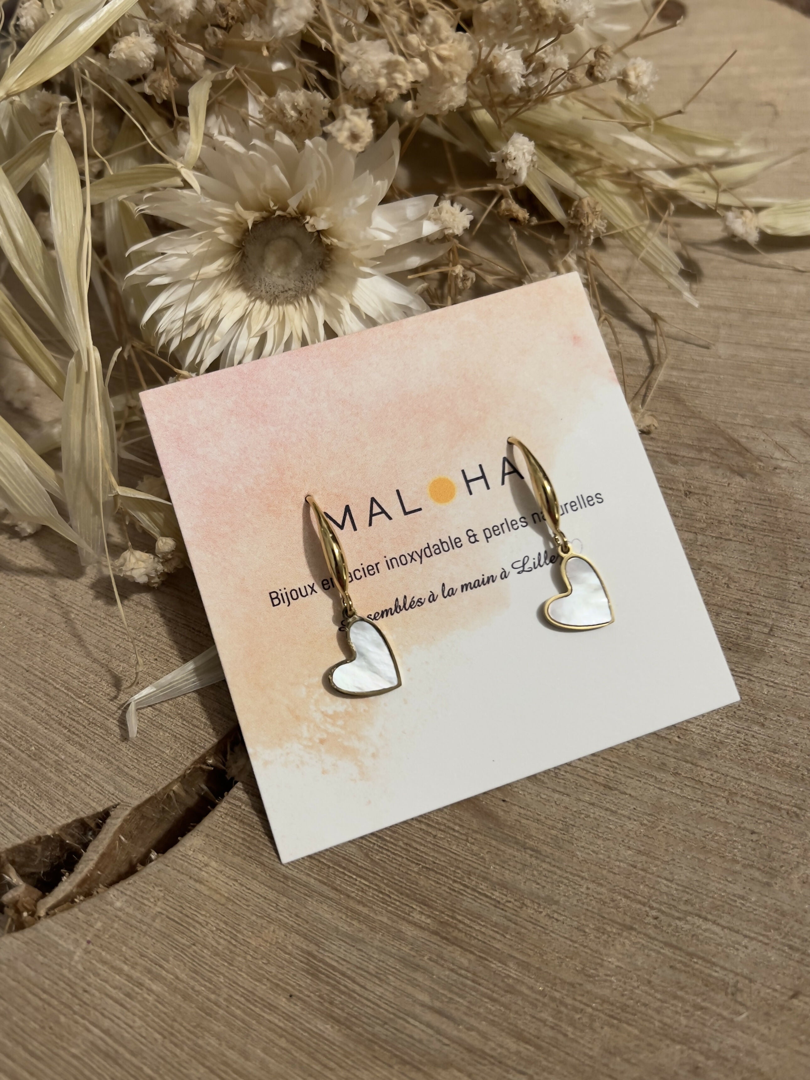 Mother-of-pearl heart dangle earrings