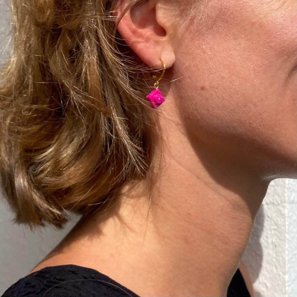Mini stainless steel sleeper earrings with a Lego® brick