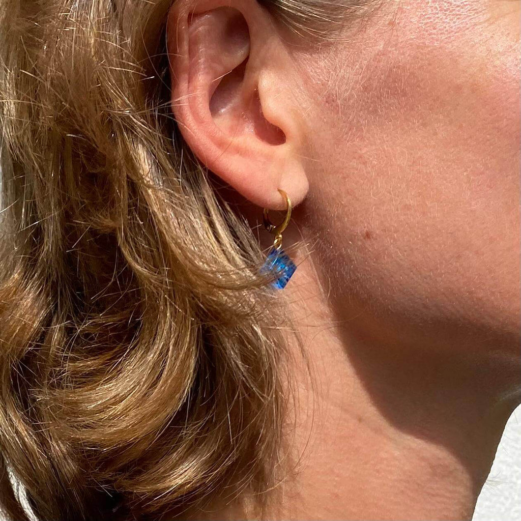 Mini stainless steel sleeper earrings with a Lego® brick