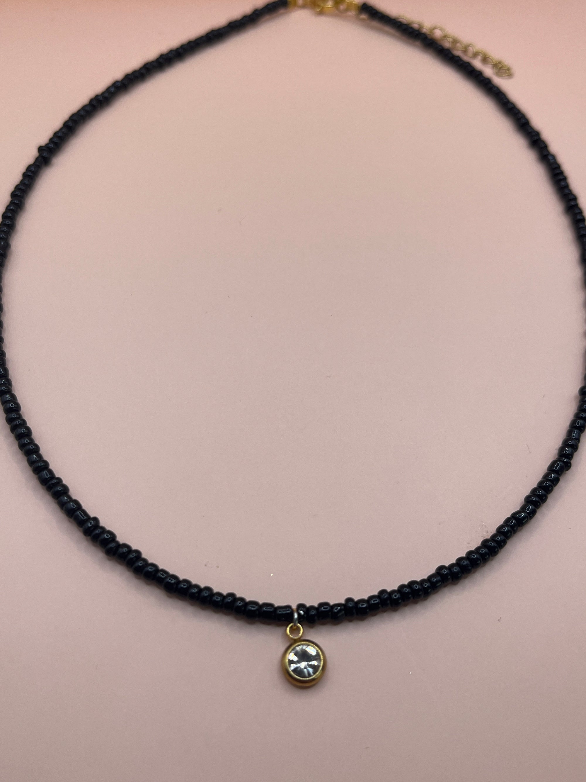 collier medaillon perles