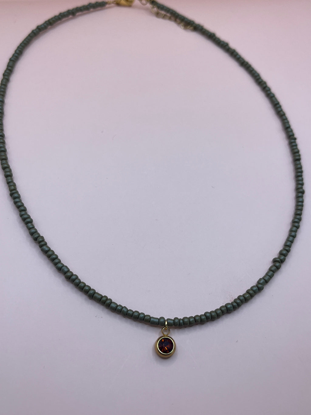 collier perles tendance medaillon