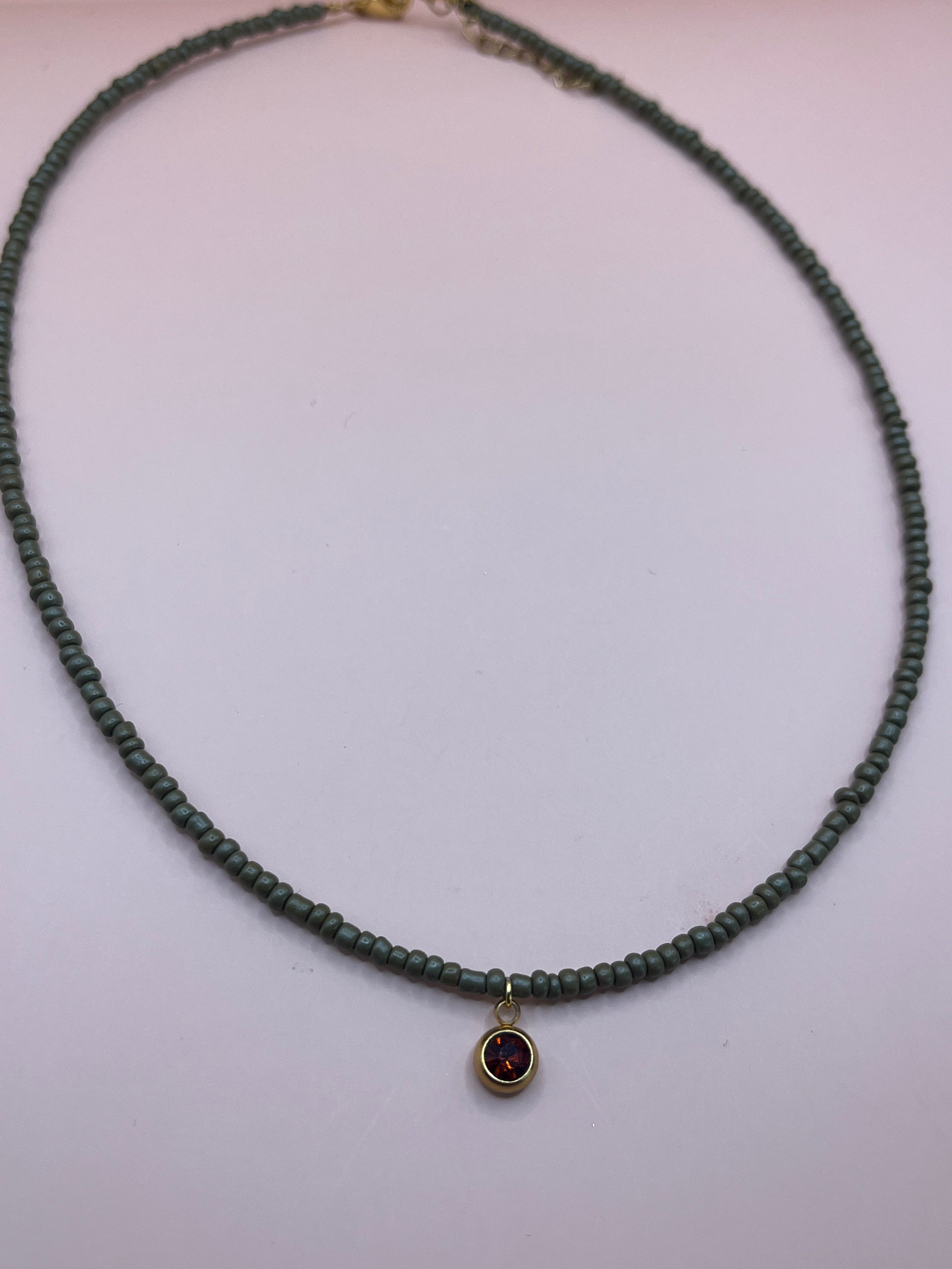 collier perles tendance medaillon