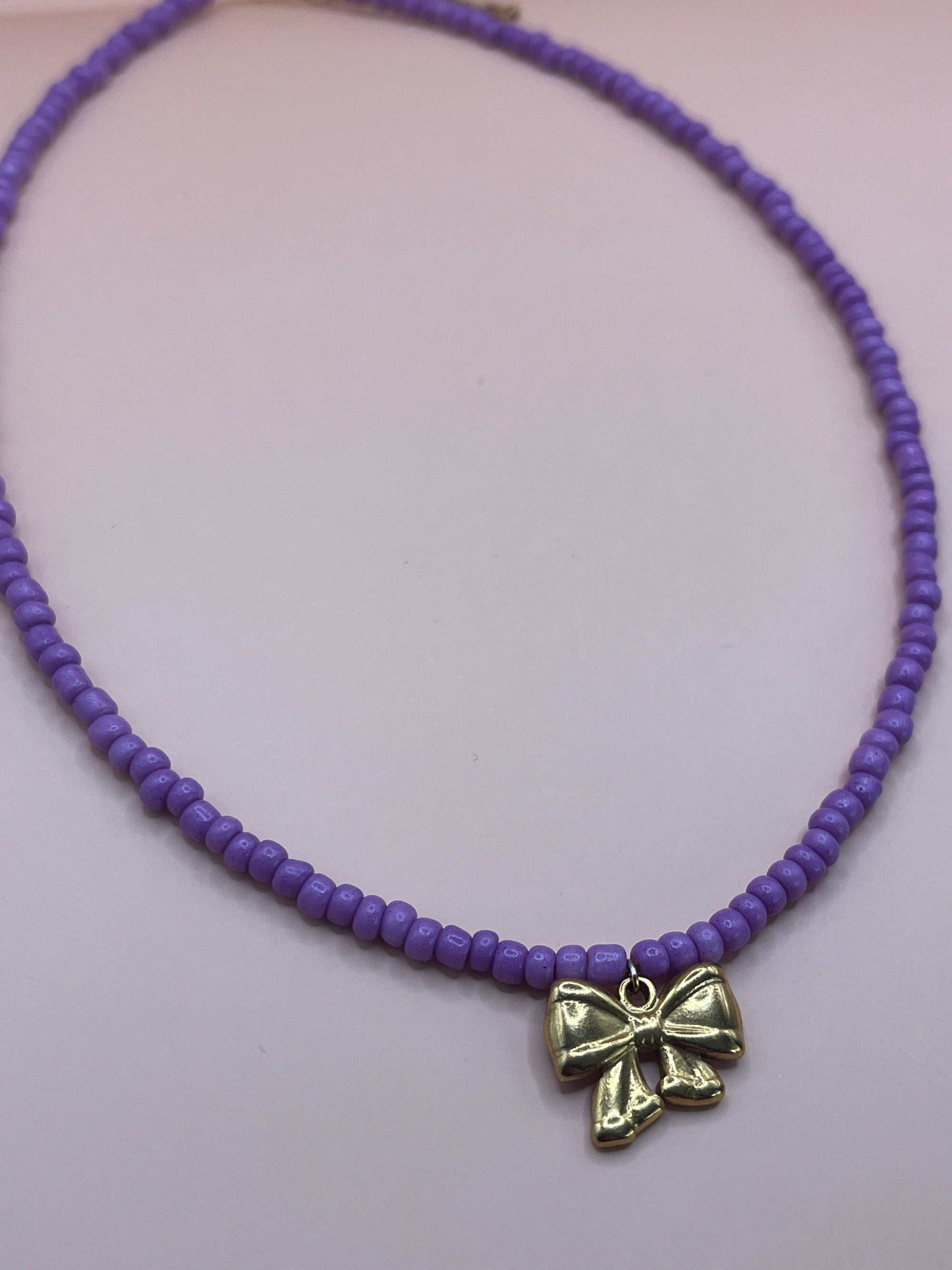 collier violet tendance
