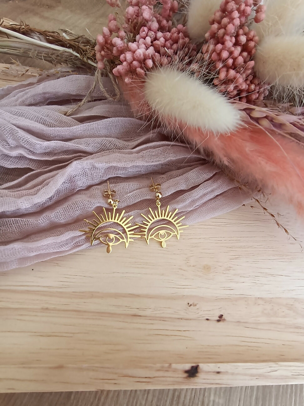 BOUCLE OEIL DORE