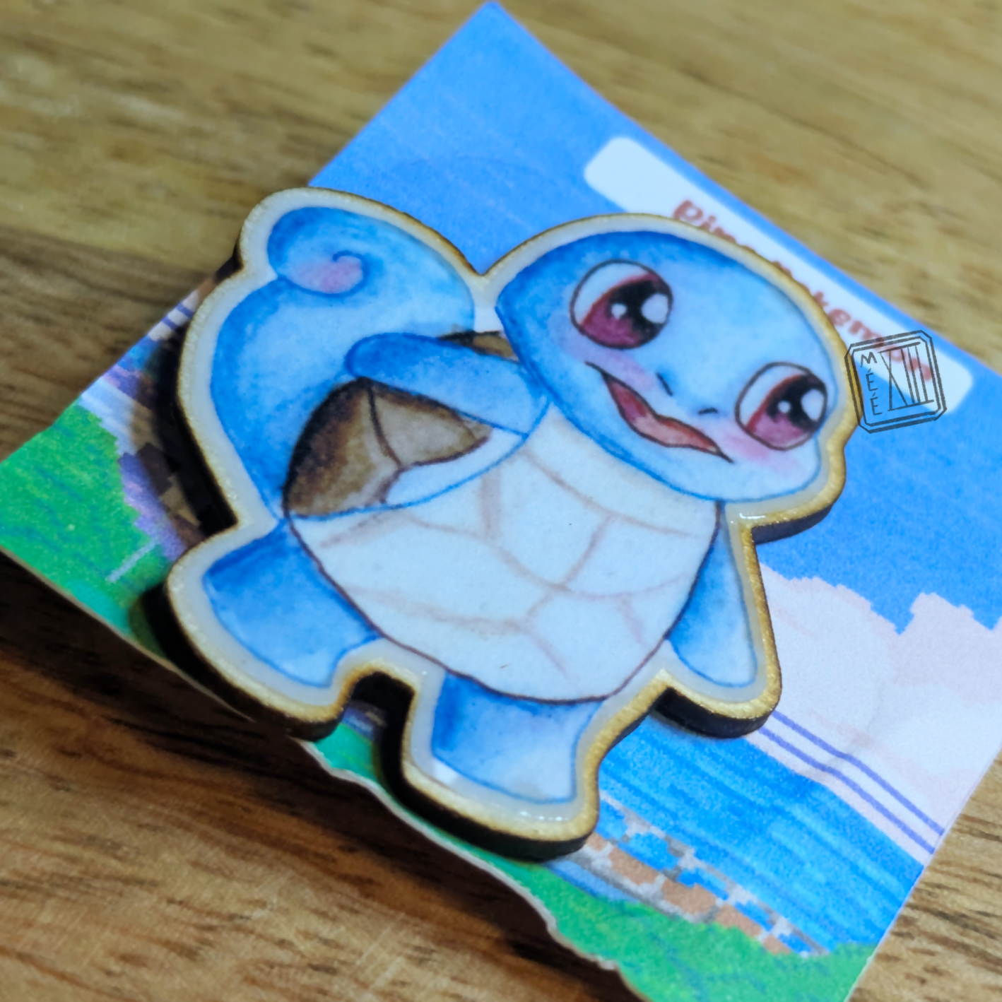 Pin's petit monstre bleu