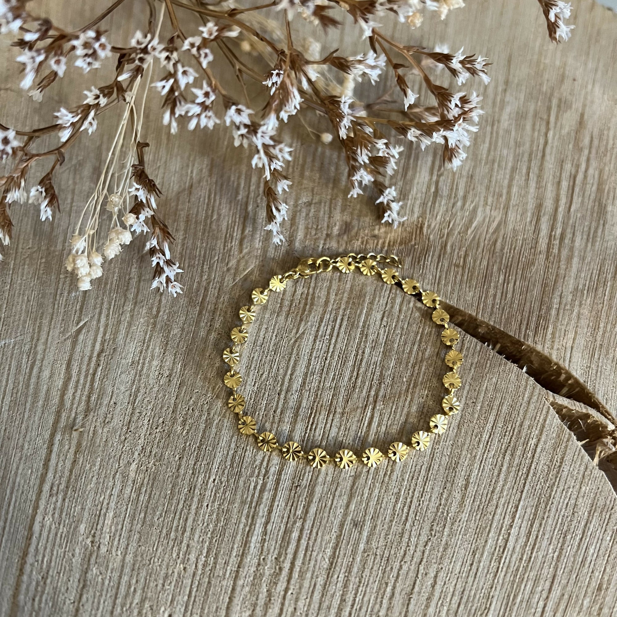 Bracelet petits soleils dorés