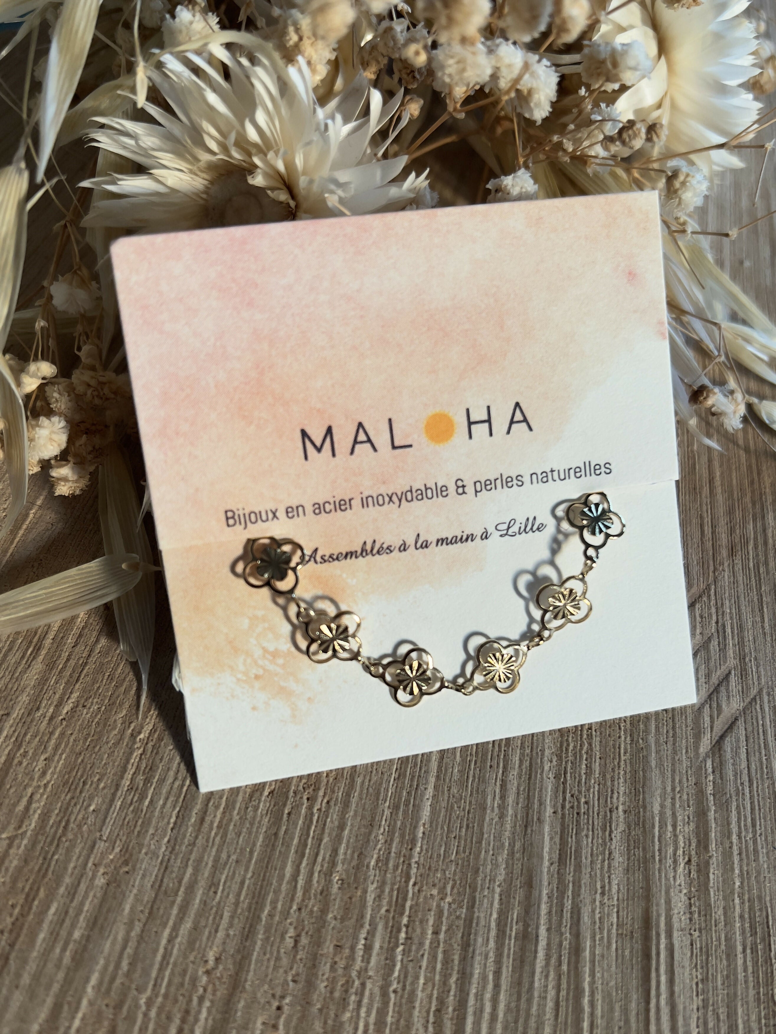Gold stainless steel flower/sun bracelet