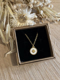 Mother-of-pearl necklace & its 4-leaf clover