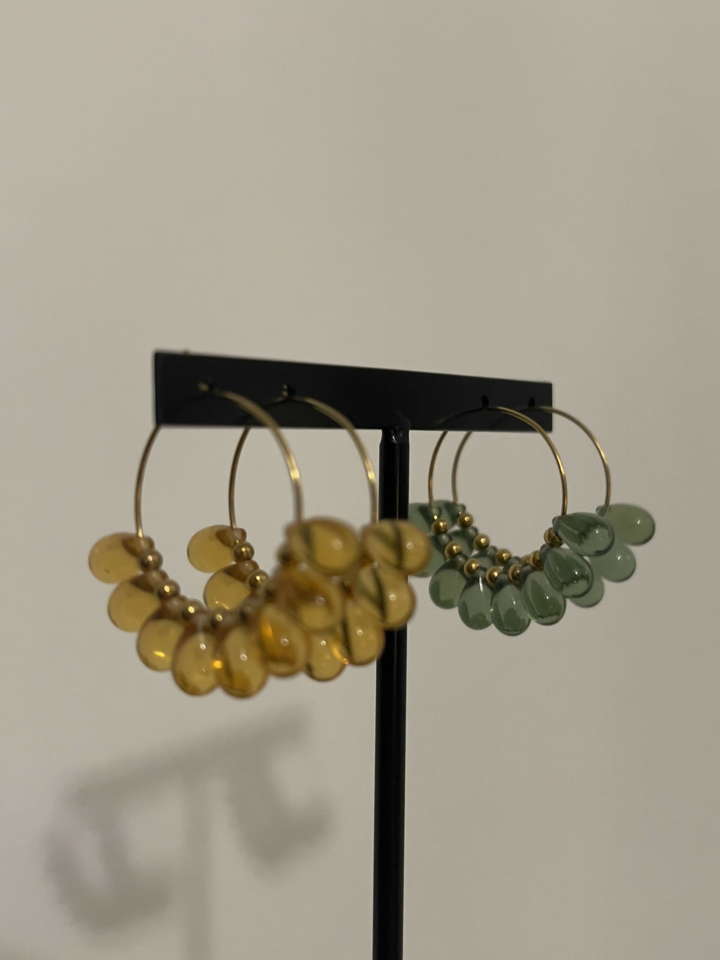 Green droplet hoop earrings